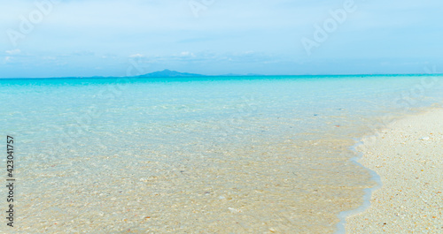 Fototapeta Naklejka Na Ścianę i Meble -  Soft blue ocean wave on clean sandy beach
