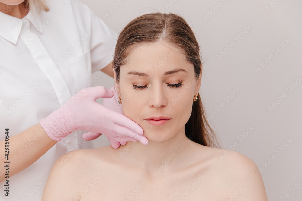portrait of a woman receiving a back massage