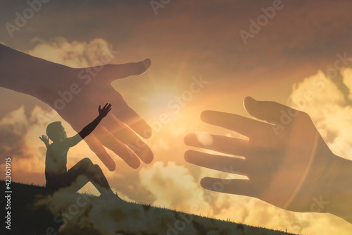 Happy man with worshiping hands reaching out for help 