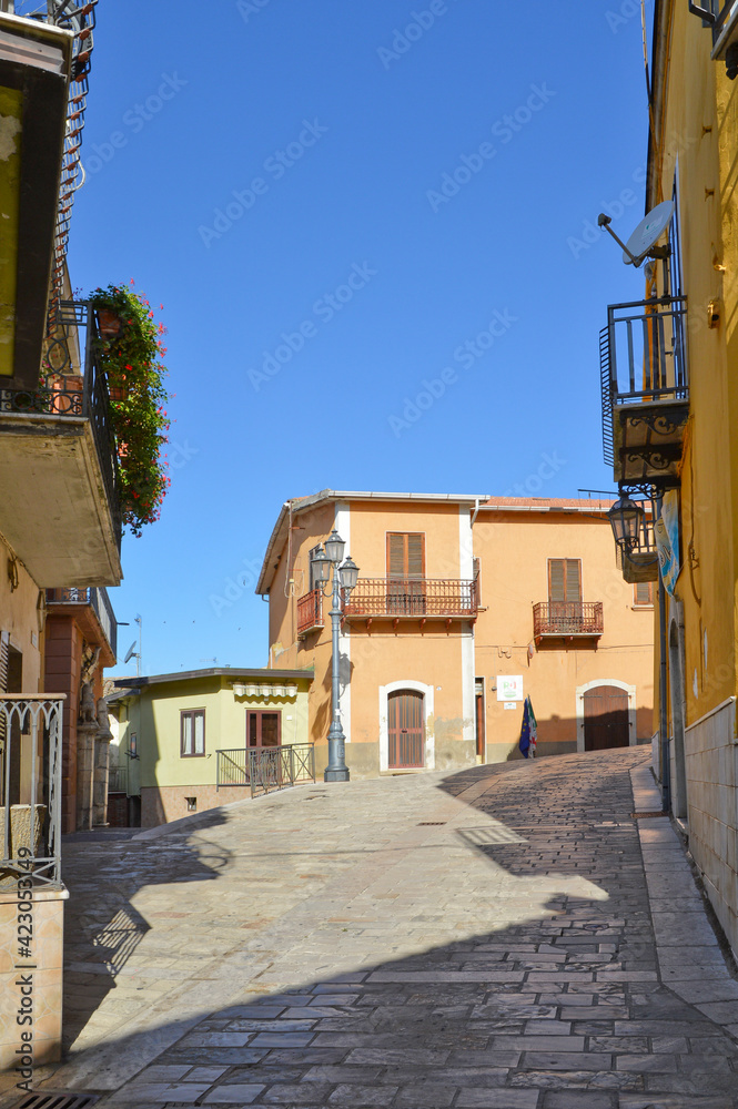 A narrow street among the old houses of Monteverde, a medieval village in the province of Avellino. A narrow street among the old houses of Monteverde, a medieval village in the province of Avellino.