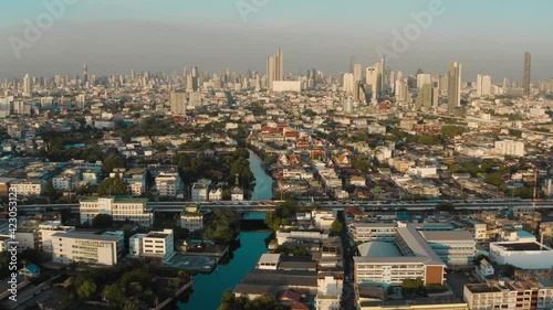 Aerial view of Wat Paknam Bhasicharoen, a temple, pagoda and Buddha statue in Bangkok Thailand. High quality 4k footage photo