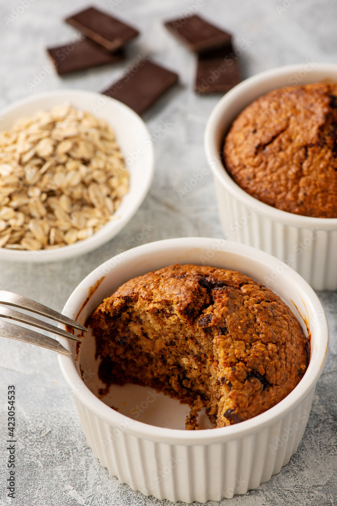 Homemade oat flakes muffins with peanut butter and chocolate. Homemade oat flakes muffins with peanut butter and chocolate.
