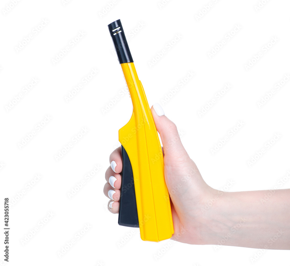 Electric stove lighter in hand on white background isolation