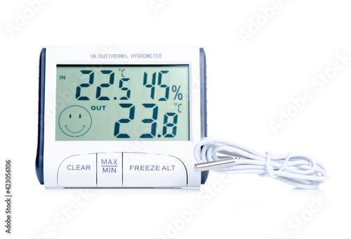 electronic clock thermometer hygrometer on white background isolation photo