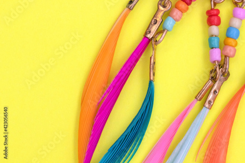 Ethnic decorations on colored sheets of paper.