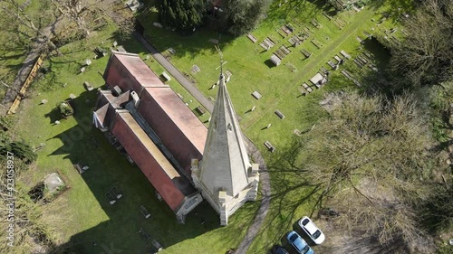 Drone overhead Church Spires Birds eye view rise to reveal cross St Mary's Church, Widford. photo