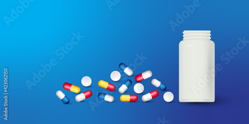 Bottle and scattered pills on color background.