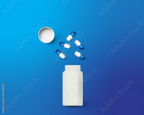 Bottle and scattered pills on color background.