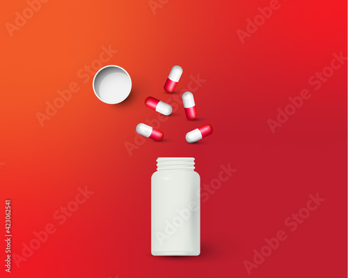 Bottle and scattered pills on color background.