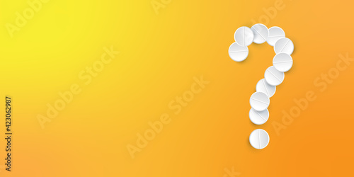 Pharmaceutical pills on a orange background. Concept question mark