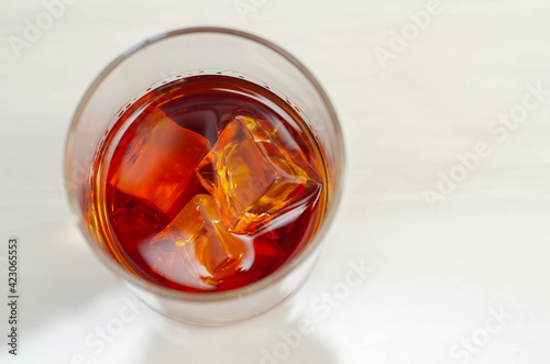 Excellent whisky served with ice cubes in a glass of Old fashioned type