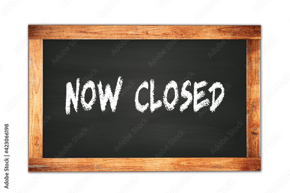 Obraz premium NOW CLOSED text written on wooden frame school blackboard.