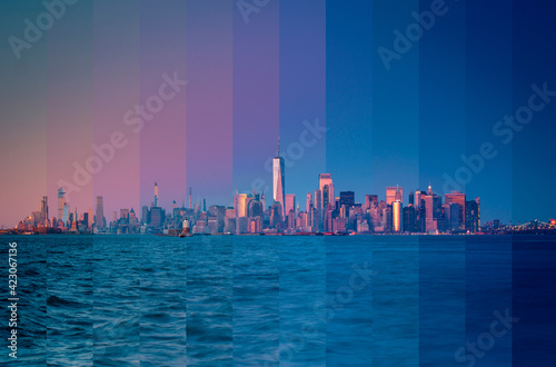 East River in New York City with contemporary skyscrapers under cloudy sky at sunset photo