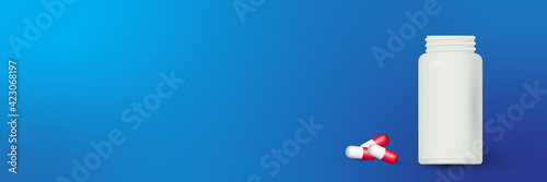Bottle and scattered pills on color background.