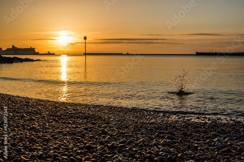 sunset on the beach © Aliona
