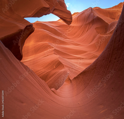 Picturesque landscape of lower antelope slot canyon with red sandstone located in desert arid terrain of United States of America photo