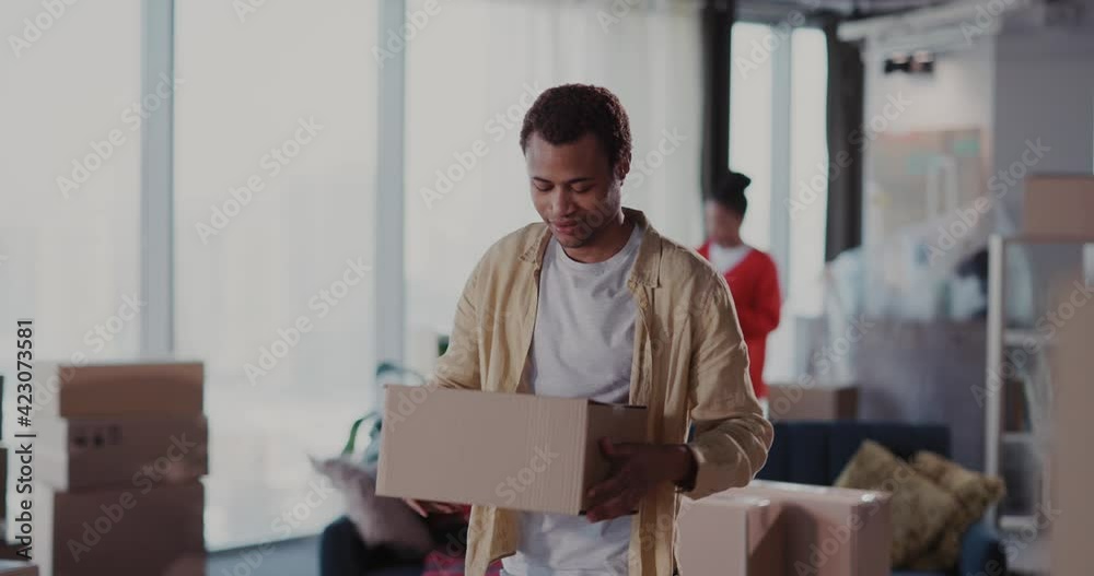 Cheerful Handsome Young Black Man in Casual Clothes Emptying Apartment Old House Moving Home with Wife Enjoying Event. Preparation. Portraits.