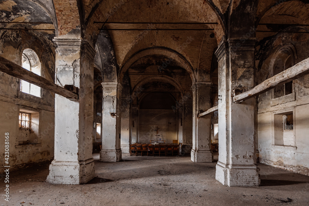 Obraz premium Interior of dark creepy abandoned lutheran church of the Virgin Mary