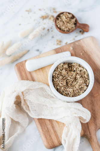 Photography Slippery Elm in bowl on marble background