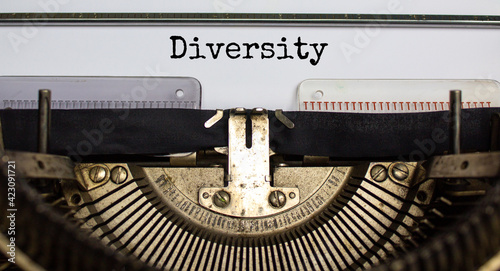 Inclusion and diversity symbol. The word 'diversity' typed on retro typewriter. Business, inclusion and diversity concept. Beautiful background.
