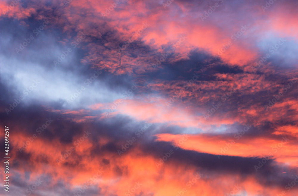 Futuric sky at sunset, in red, blue, pink and turquoise colors 