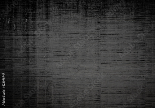 Old grunge scratched cement wall background texture.