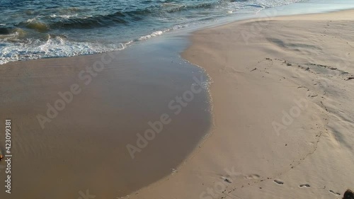 Wallpaper Mural Aerial view of girl walking on Piratininga beach in Niterói, Rio de Janeiro. Sunny day. Drone take Torontodigital.ca