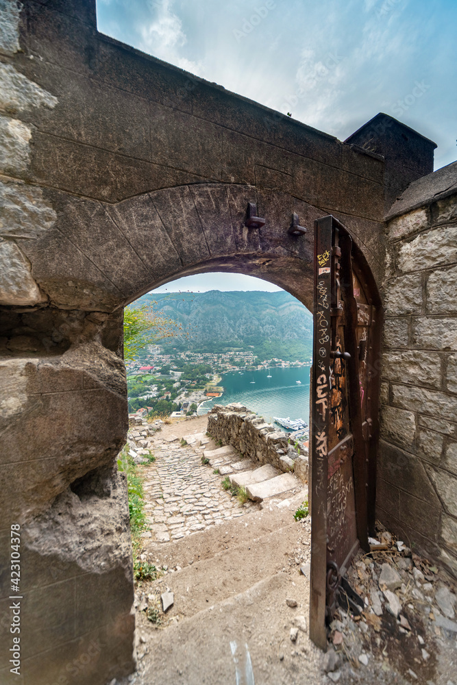 View through an open ancient doorway of the Fortress,overlooking the Bay of Kotor,Montenegro