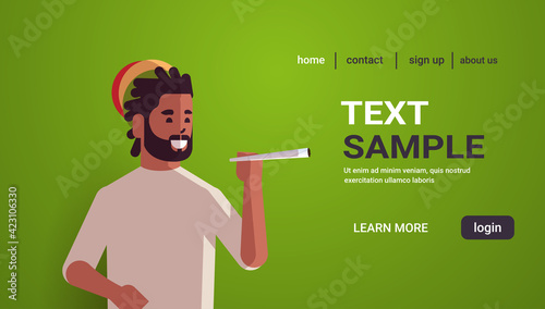 african american guy smoking cannabis marijuana joint drug consumption concept portrait horizontal copy space
