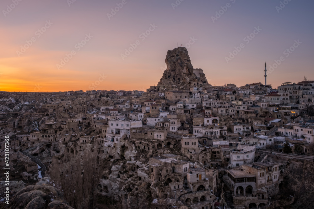 Town of Ortahisar at the sunset. Cappadocia, Turkey. February 2021