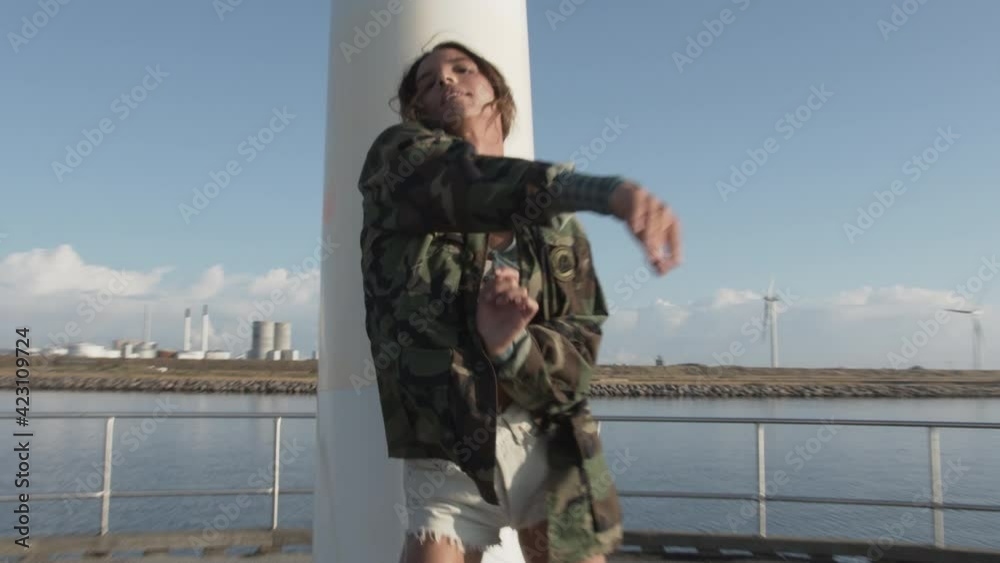 Dancer Performing Routine On Pier Dancer Performing Routine On Pier