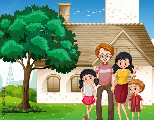 Happy family standing in front of the house