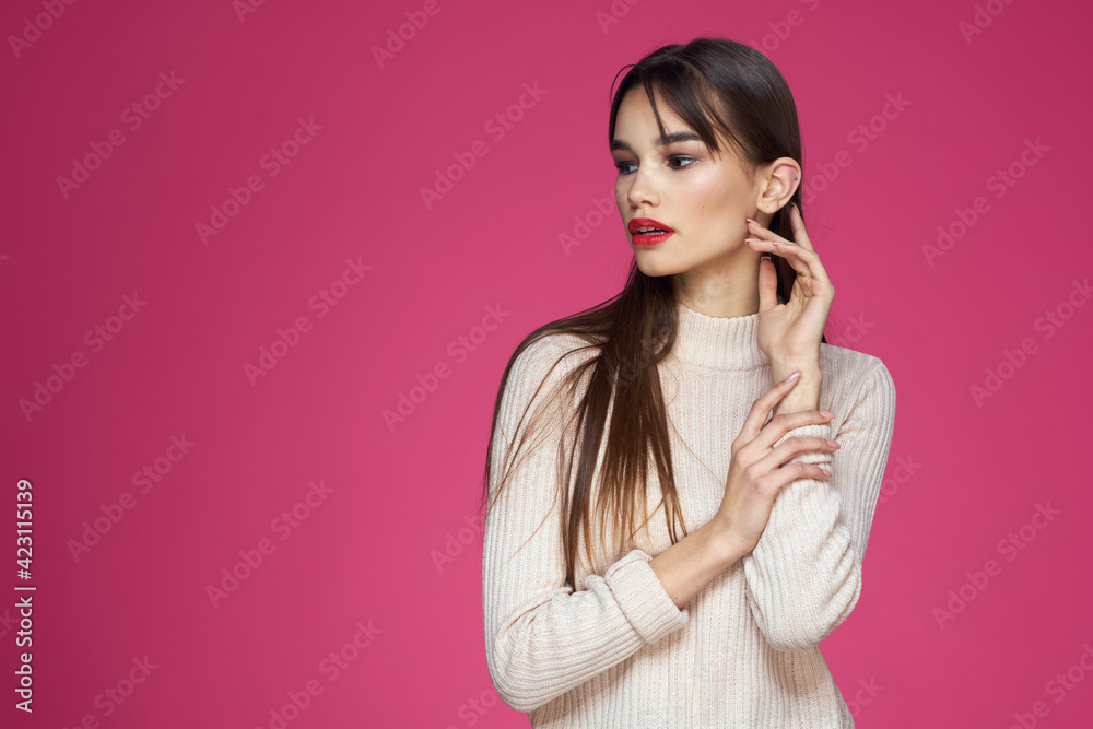 Woman with red lips bright makeup white blouse long hair pink background Woman with red lips bright makeup white blouse long hair pink background