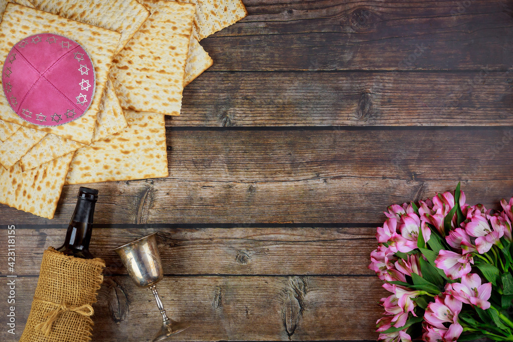 Passover symbols matzoh, red wine and flowers. Passover symbols matzoh, red wine and flowers.