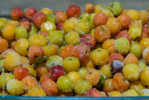 Group of frozen acerolas fruits