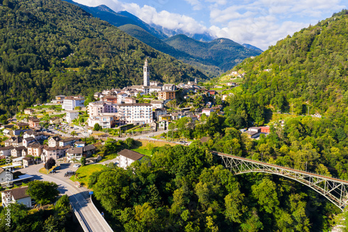 Fototapeta Naklejka Na Ścianę i Meble -  View from drone of houses of village Intragna in mountain valley in sunny summer day