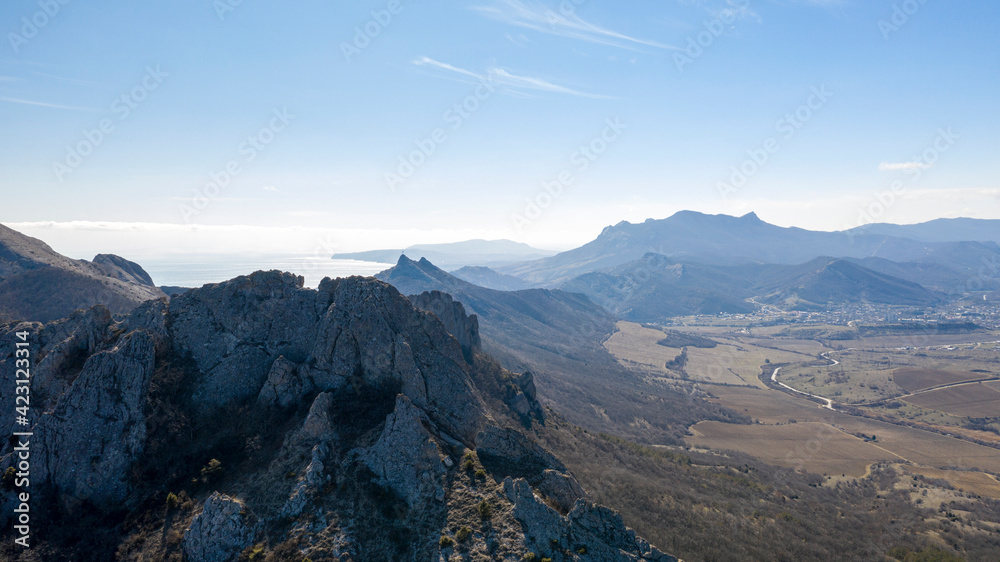 Coast of the Crimea peninsula, rocky mountains, aerial view of the sea resort of Koktebel