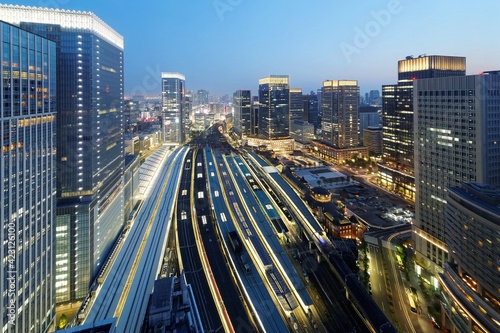 Canvas Print Beautiful nightscape of Tokyo Train Station with a high angle view of railway pl
