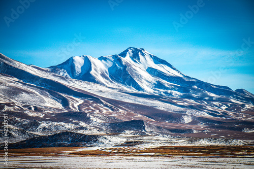 volcanic landscape in bolivia, altiplano, snow © Andrea Aigner