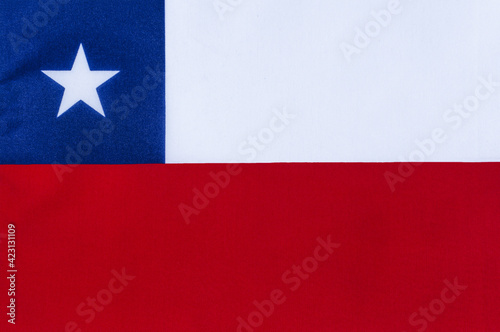 national flag of the Republic of Chile on a fabric base close-up