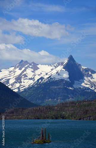 spectacular panorama of fusillade mountain and gunsight ridge from the wild goose island lookout in glacuer national park, montana