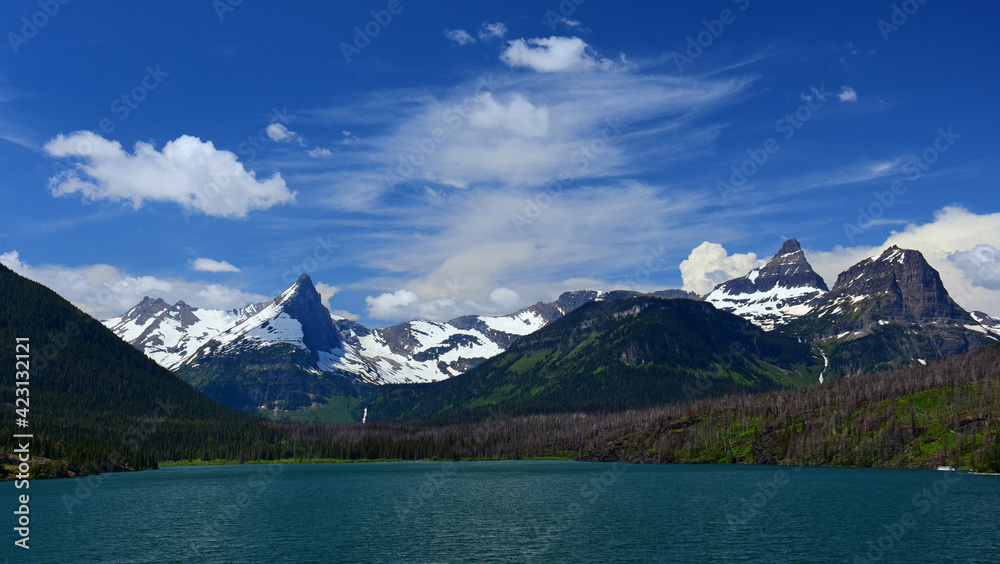 spectacular panorama of fusillade mountain and gunsight ridge from the wild goose island lookout in glacuer national park, montana