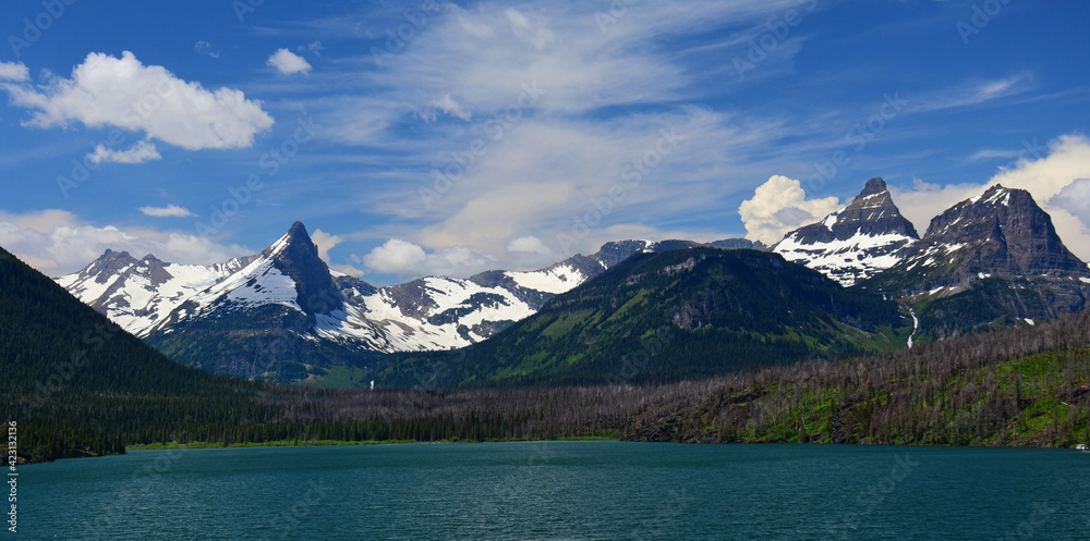 spectacular panorama of fusillade mountain and gunsight ridge from the wild goose island lookout in glacuer national park, montana
