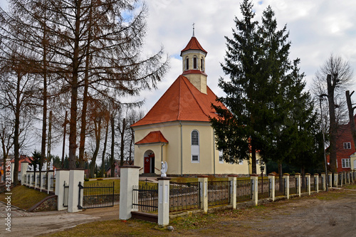 built in 1891 as a Lutheran and currently the Catholic church of Saint Stanislaus Kostka in the village of pozezdrze in warmia and masuria in Poland photo