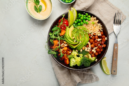 Buddha bowl of mixed grilled vegetables on light background. Healthy eating concept.