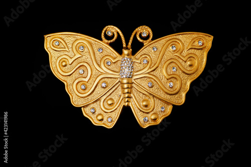 Vintage gold butterfly belt buckle from the 80s with rhinestone inlaid on it
