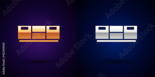 Gold and silver Furniture nightstand icon isolated on black background. Vector