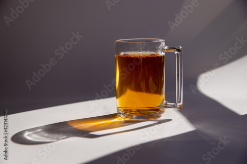 lemon tea in a clear glass on a white background