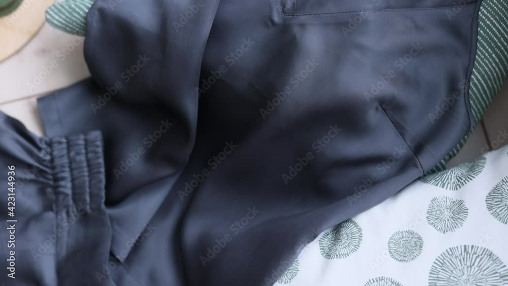 cotton pajamas shirt and shorts lying on the bed cotton pajamas shirt and shorts lying on the bed