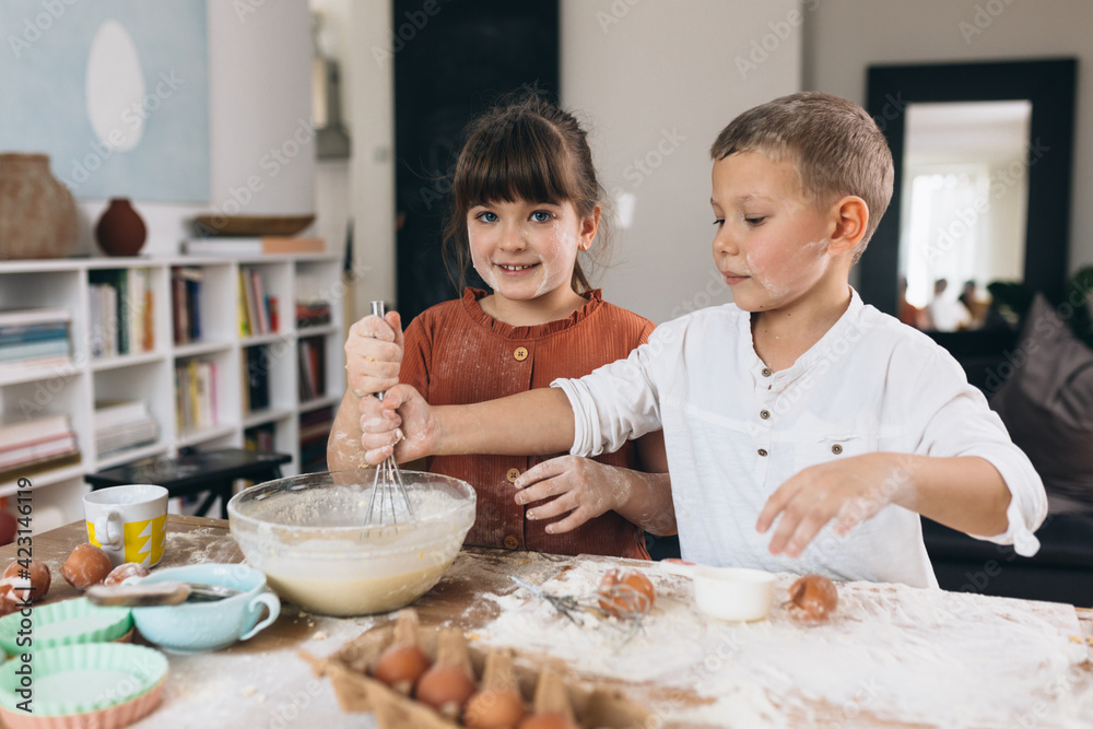 children baking with their mother at home children baking with their mother at home